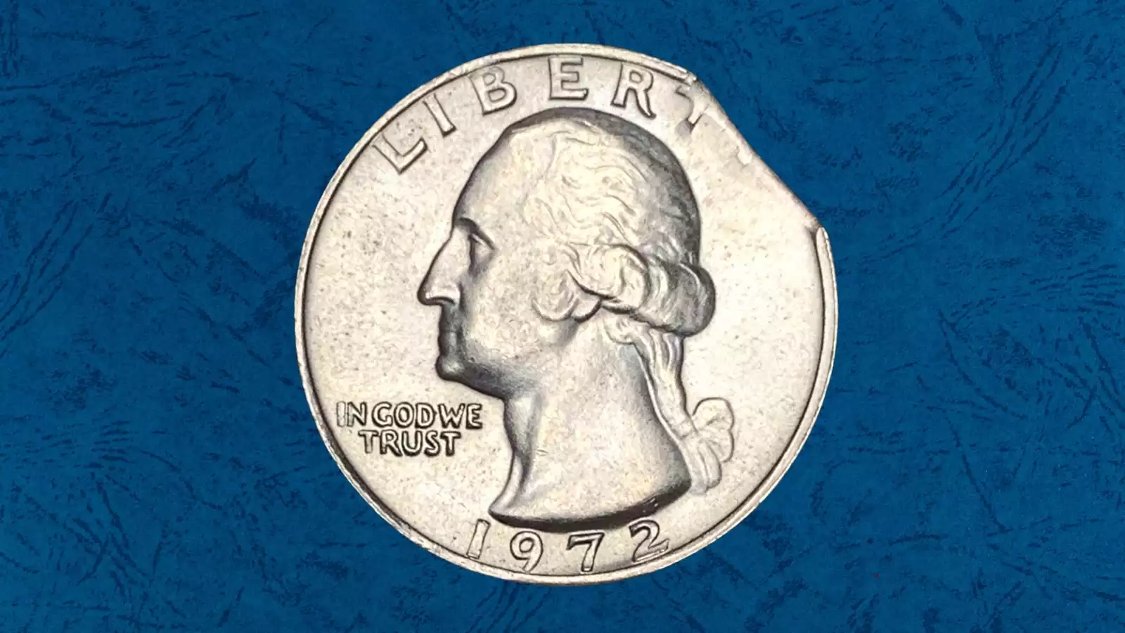 1972 Washington quarter clipped planchet error showing curved section missing from coin edge